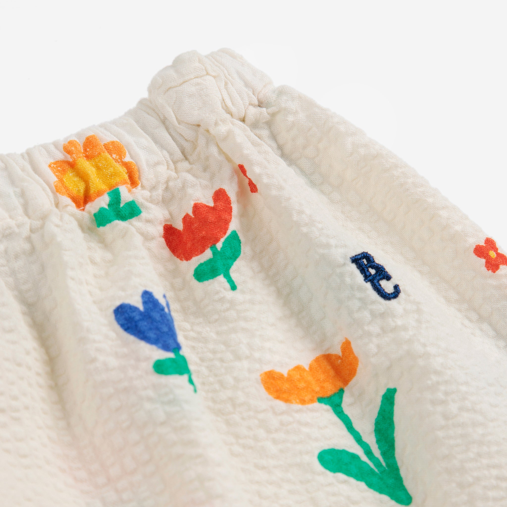 Pantalon en coton fleuri imprimé de couleur blanc cassé pour bébés garçons et filles