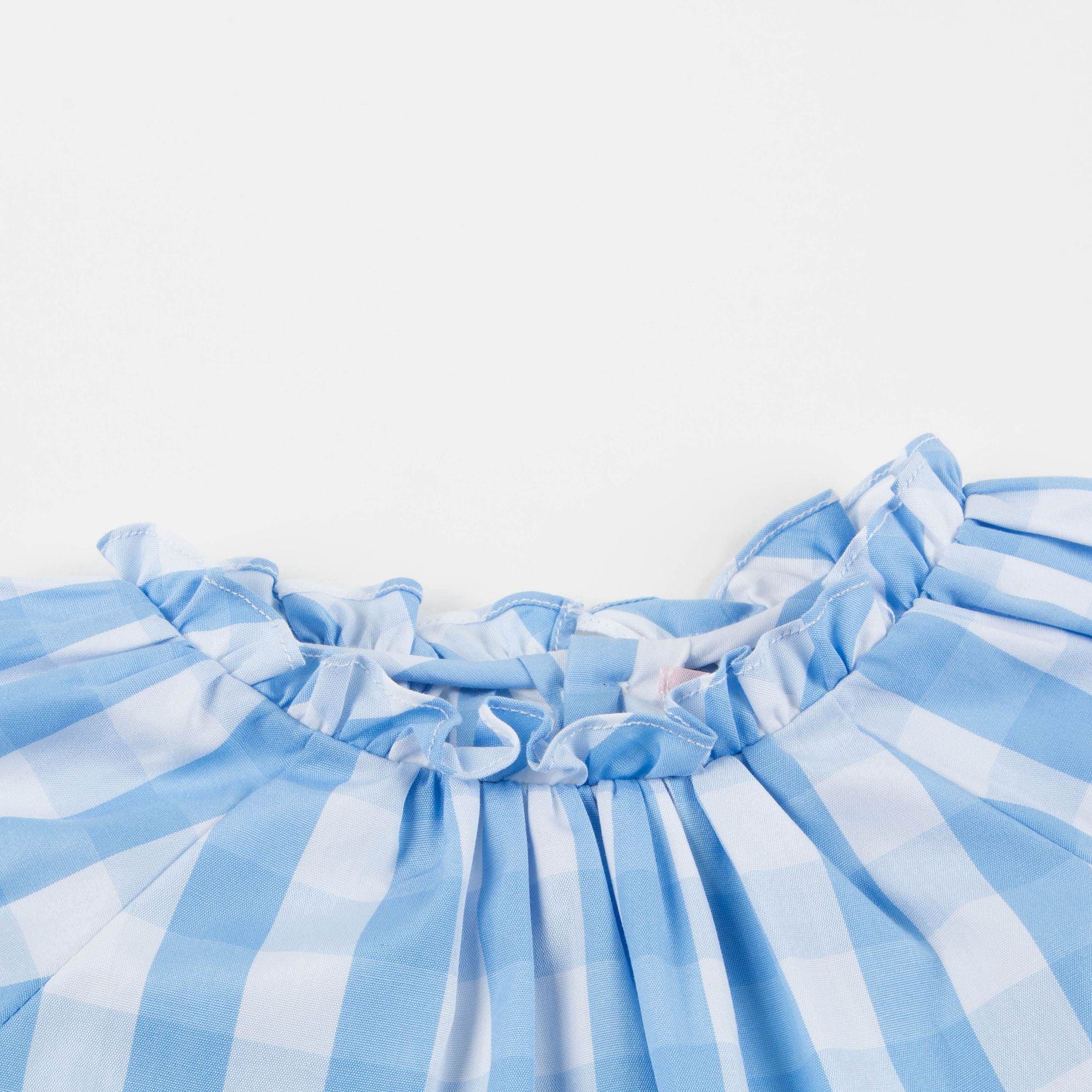 Haut à carreaux bleu et blanc pour petite fille