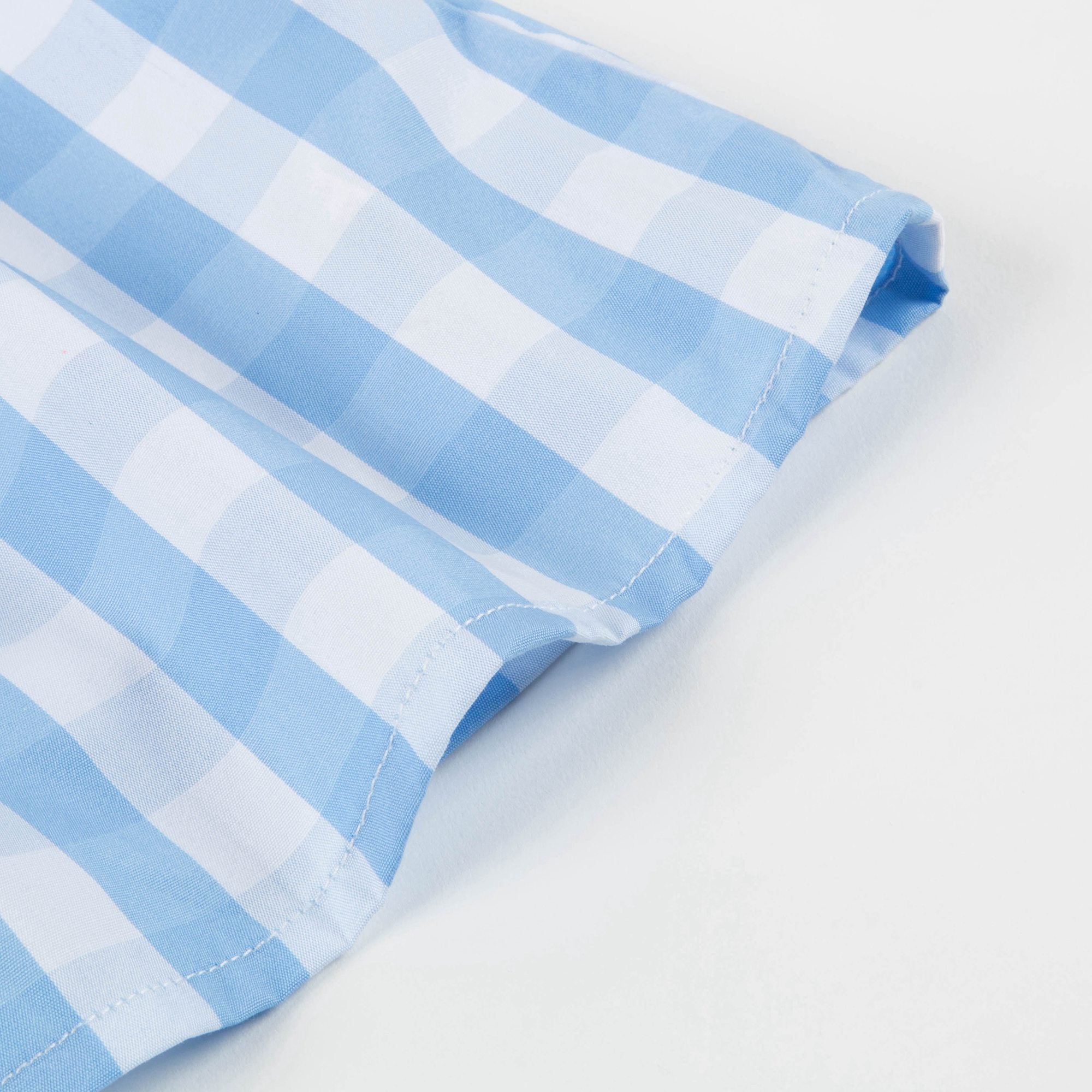 Haut à carreaux bleu et blanc pour petite fille