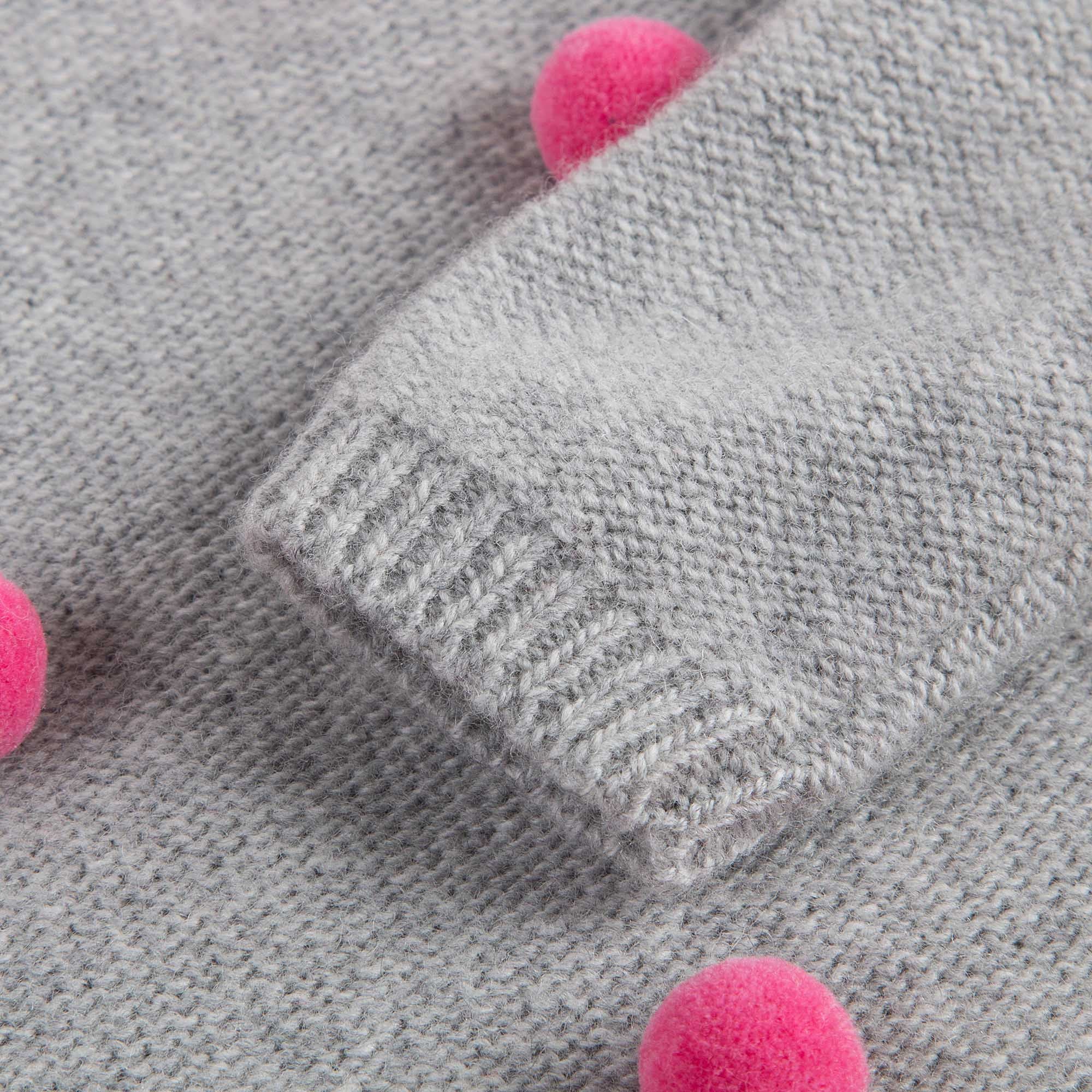 Robe tricotée en laine grise pour bébé fille avec pompons