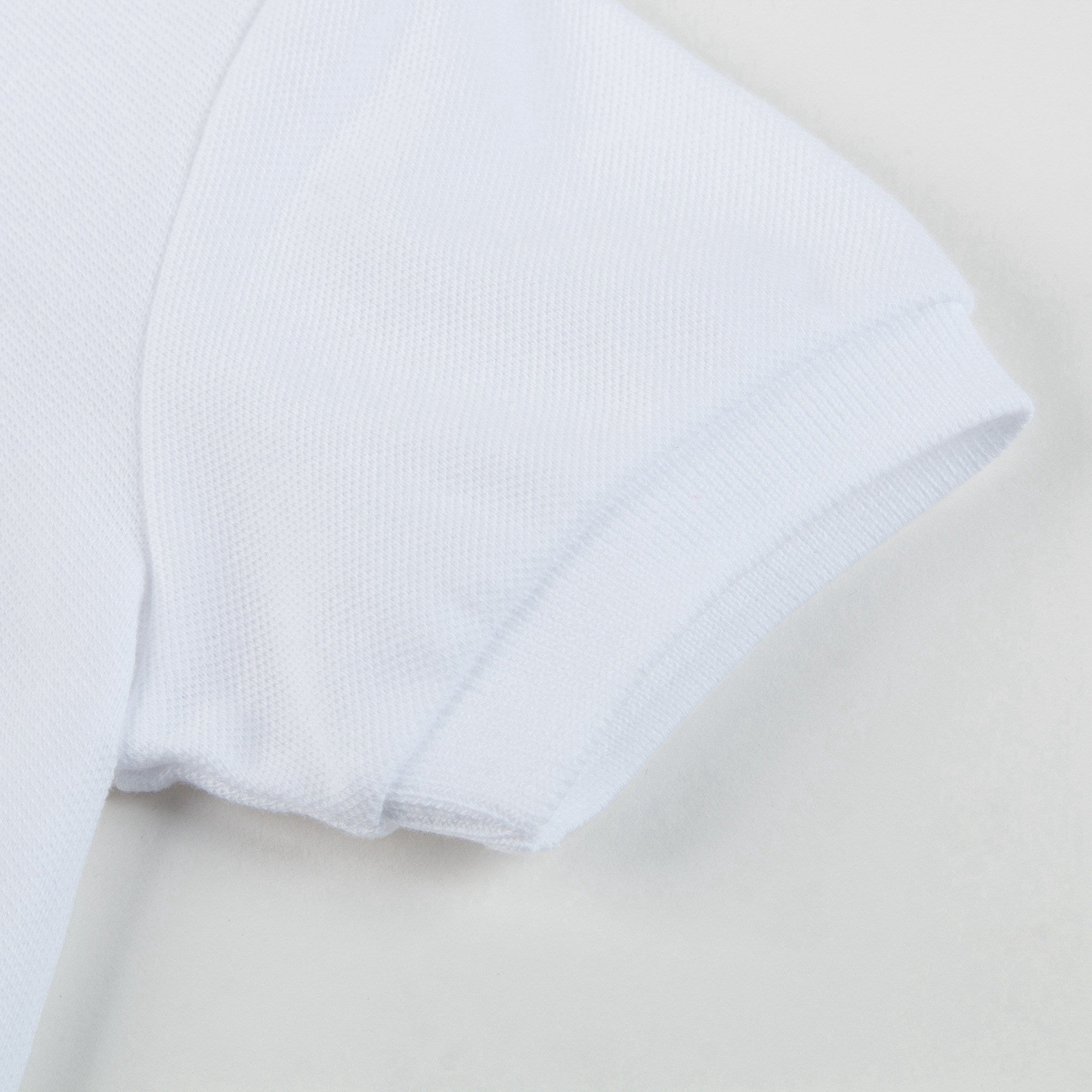 Boys White Cotton Polo Shirt With Star Trim