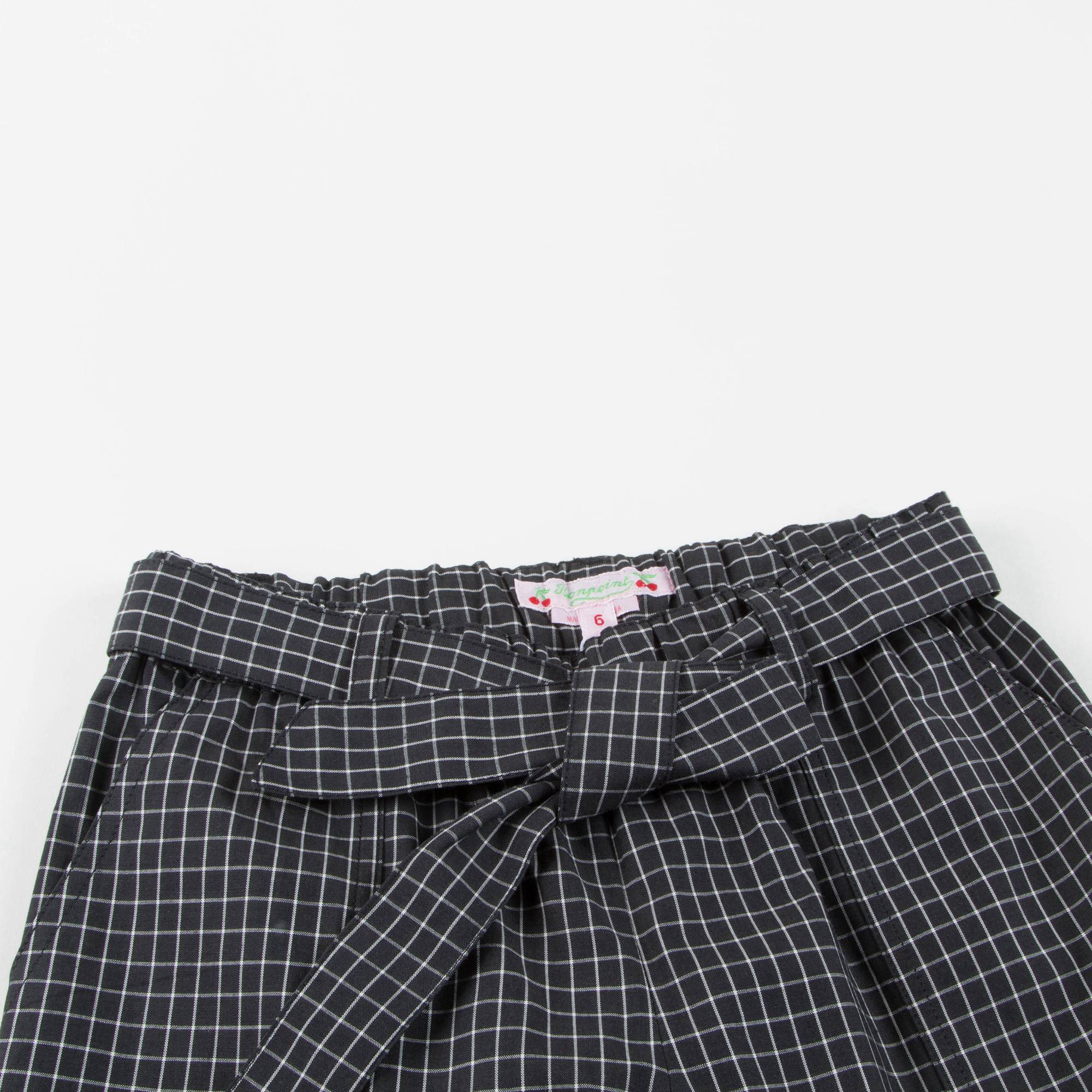 Pantalon à carreaux noirs pour fille