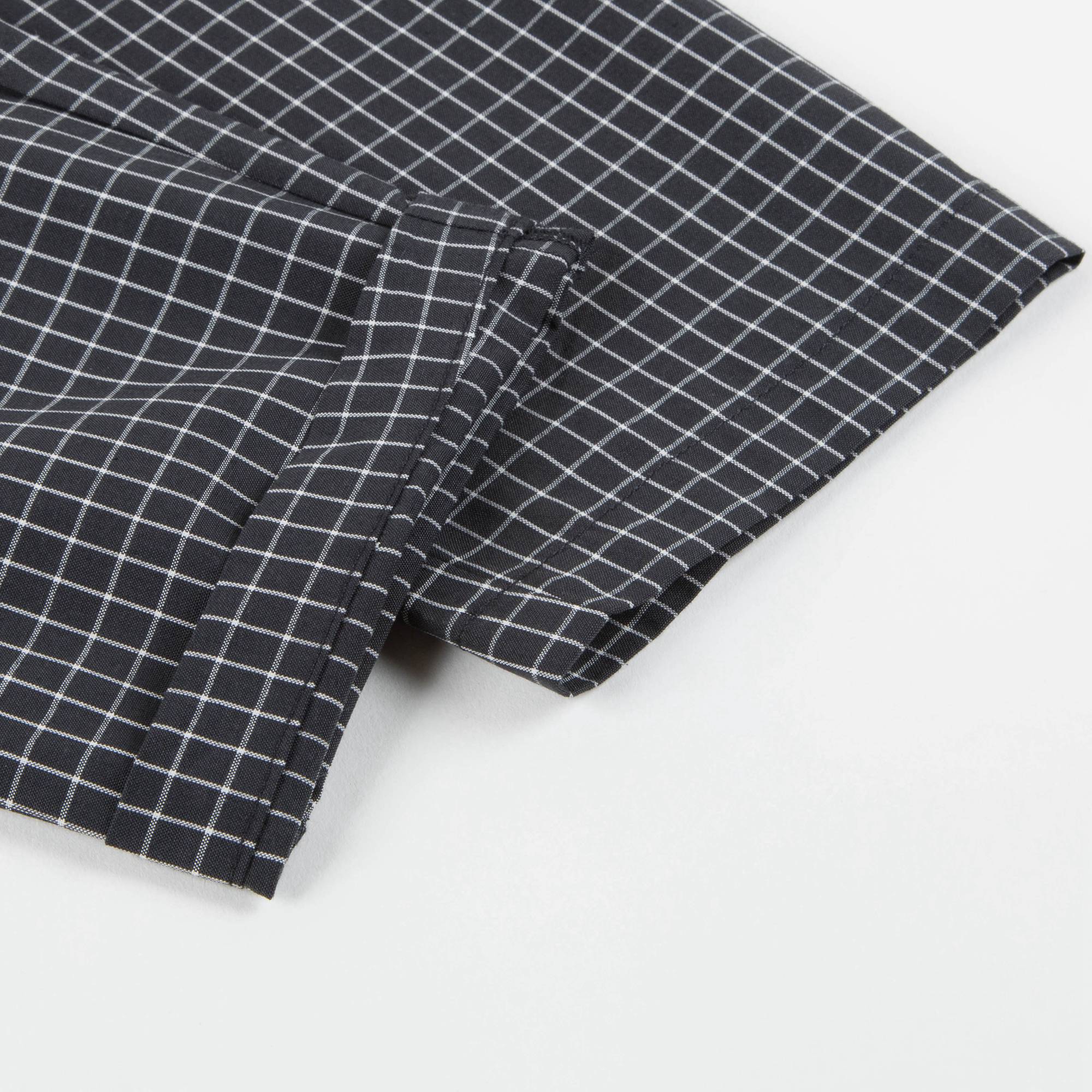 Pantalon à carreaux noirs pour fille