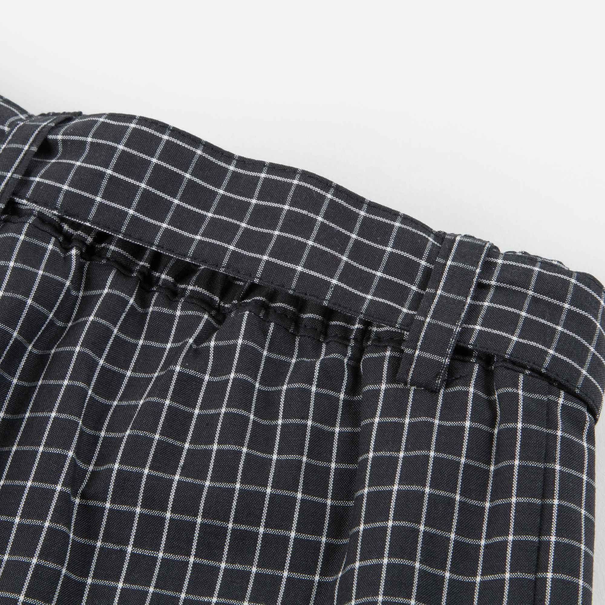 Pantalon à carreaux noirs pour fille