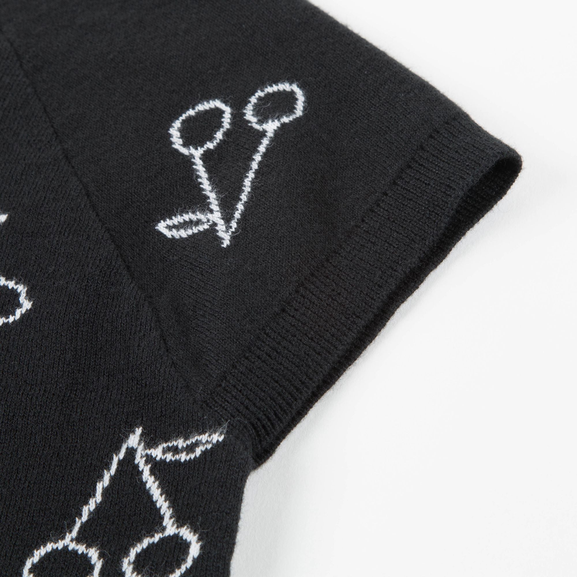 T-shirt en maille noir à imprimé cerises blanches pour fille