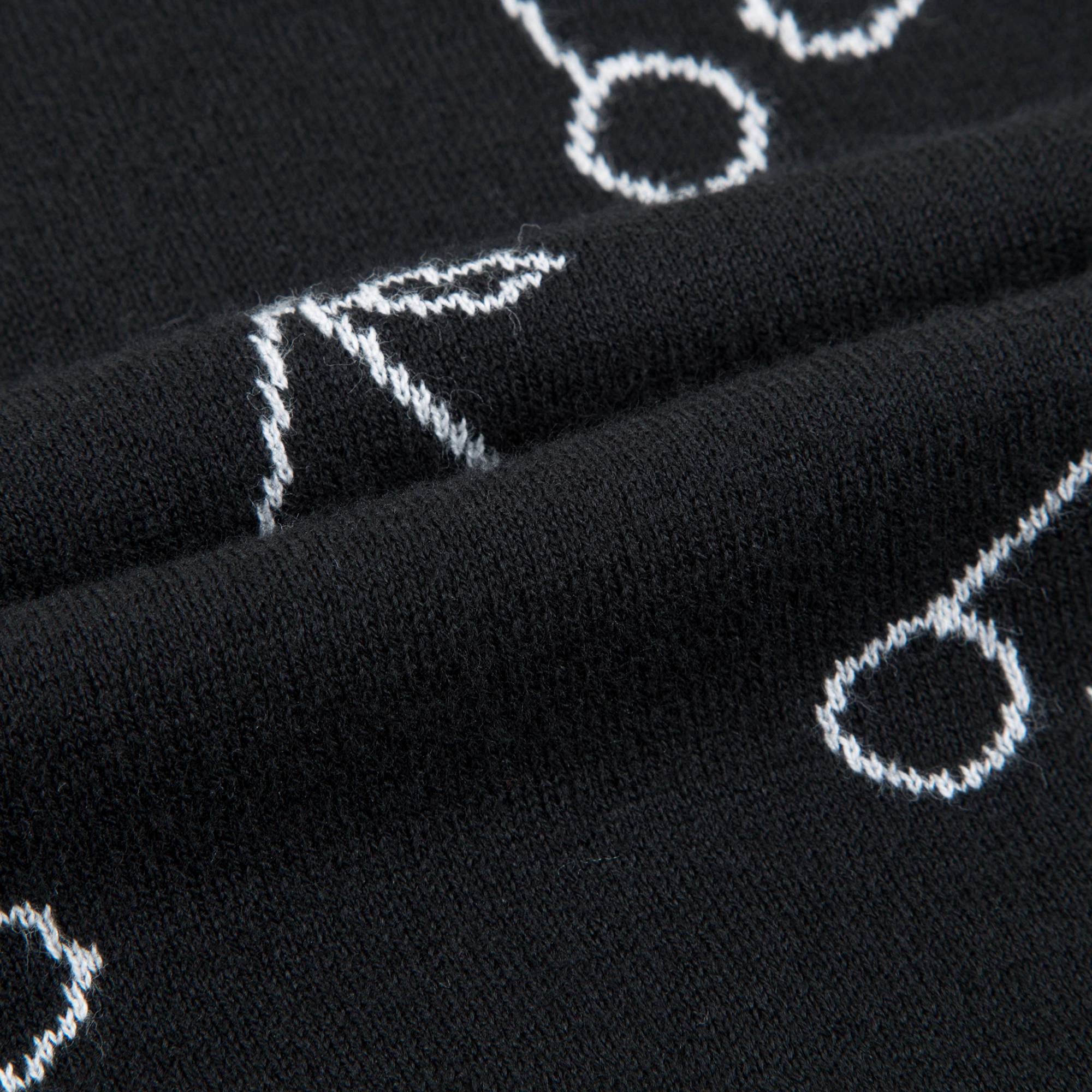 T-shirt en maille noir à imprimé cerises blanches pour fille