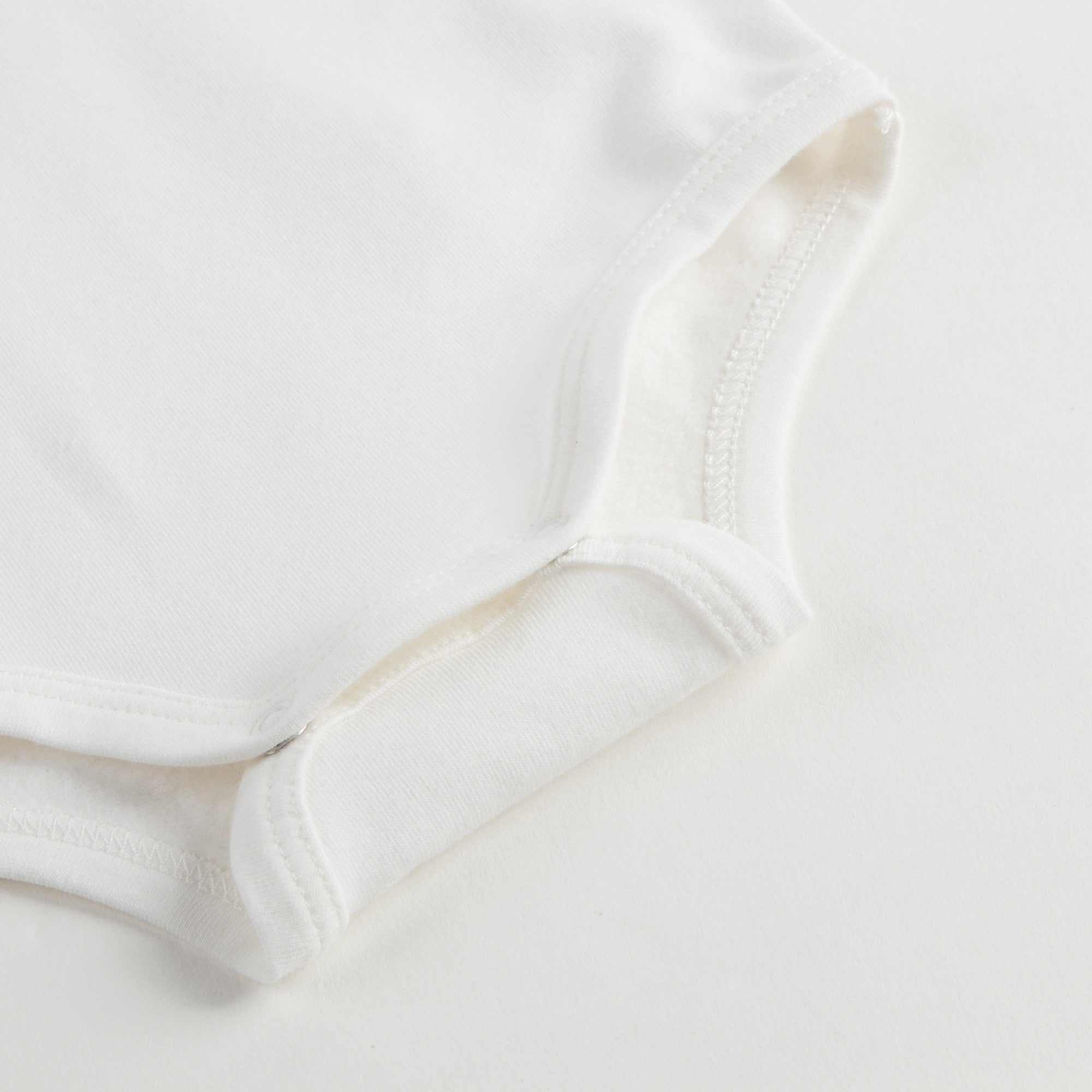 Baby Ivory Cotton Babysuit With Pom-Pom Trims