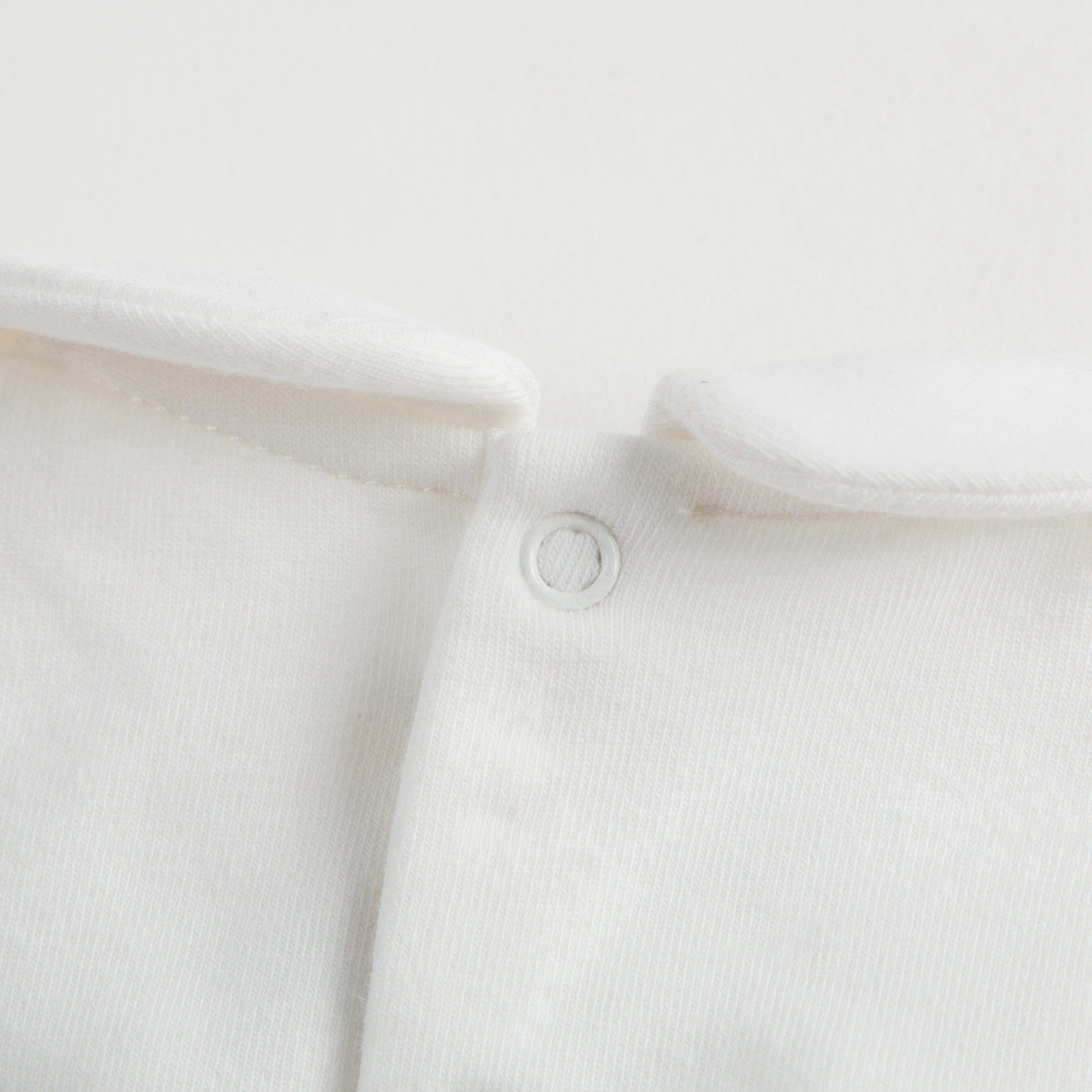 Baby Ivory Cotton Babysuit With Pom-Pom Trims