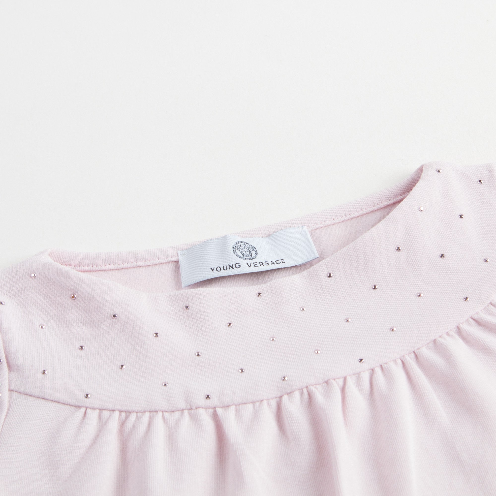 Chemisier rose en coton pour bébé fille avec finitions en strass dorés