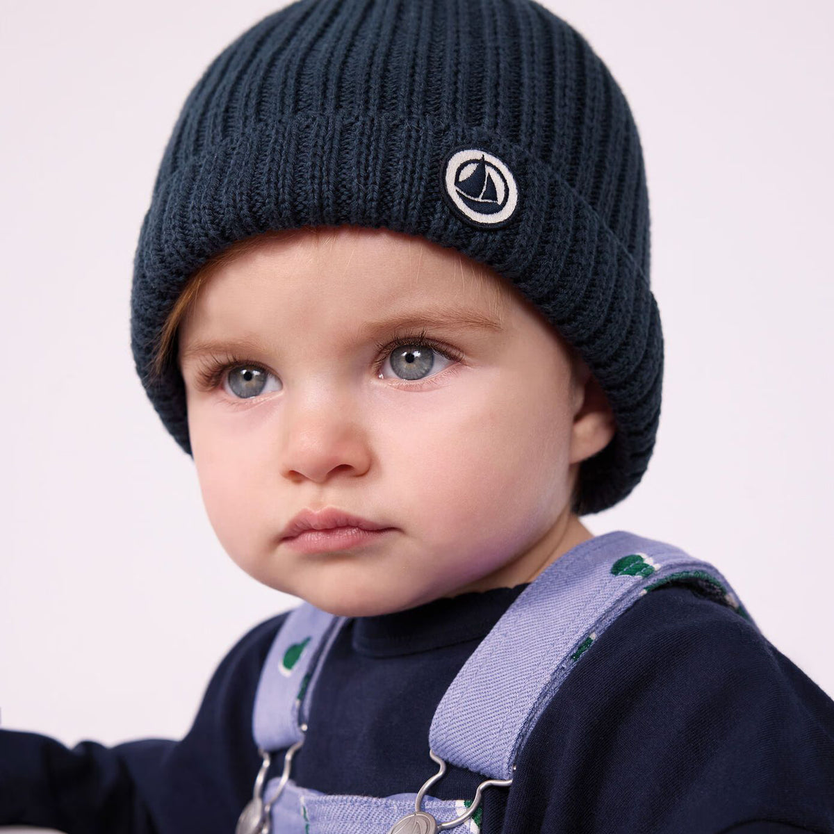 Bonnet bébé garçon en maille de coton bleu marine