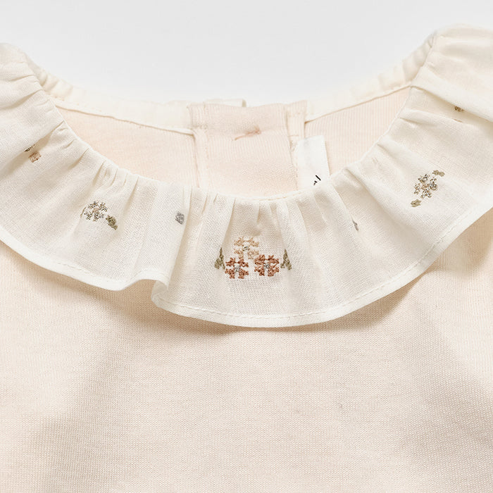 Grenouillère bébé fille en coton rose pâle à volants