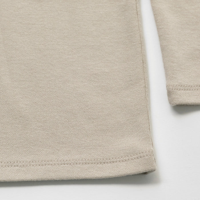 Col roulé en coton beige pour fille