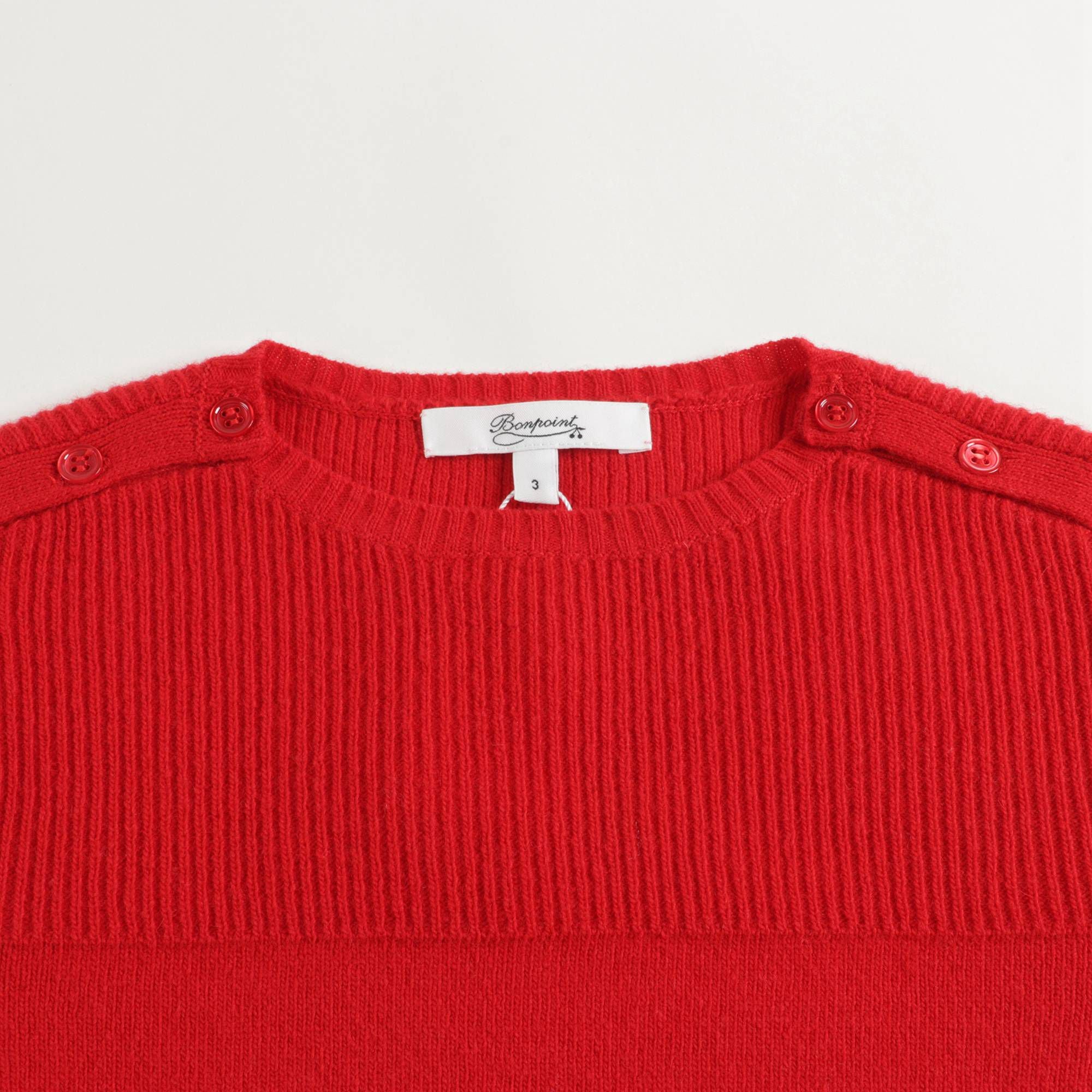 Pull géranium pour bébés filles