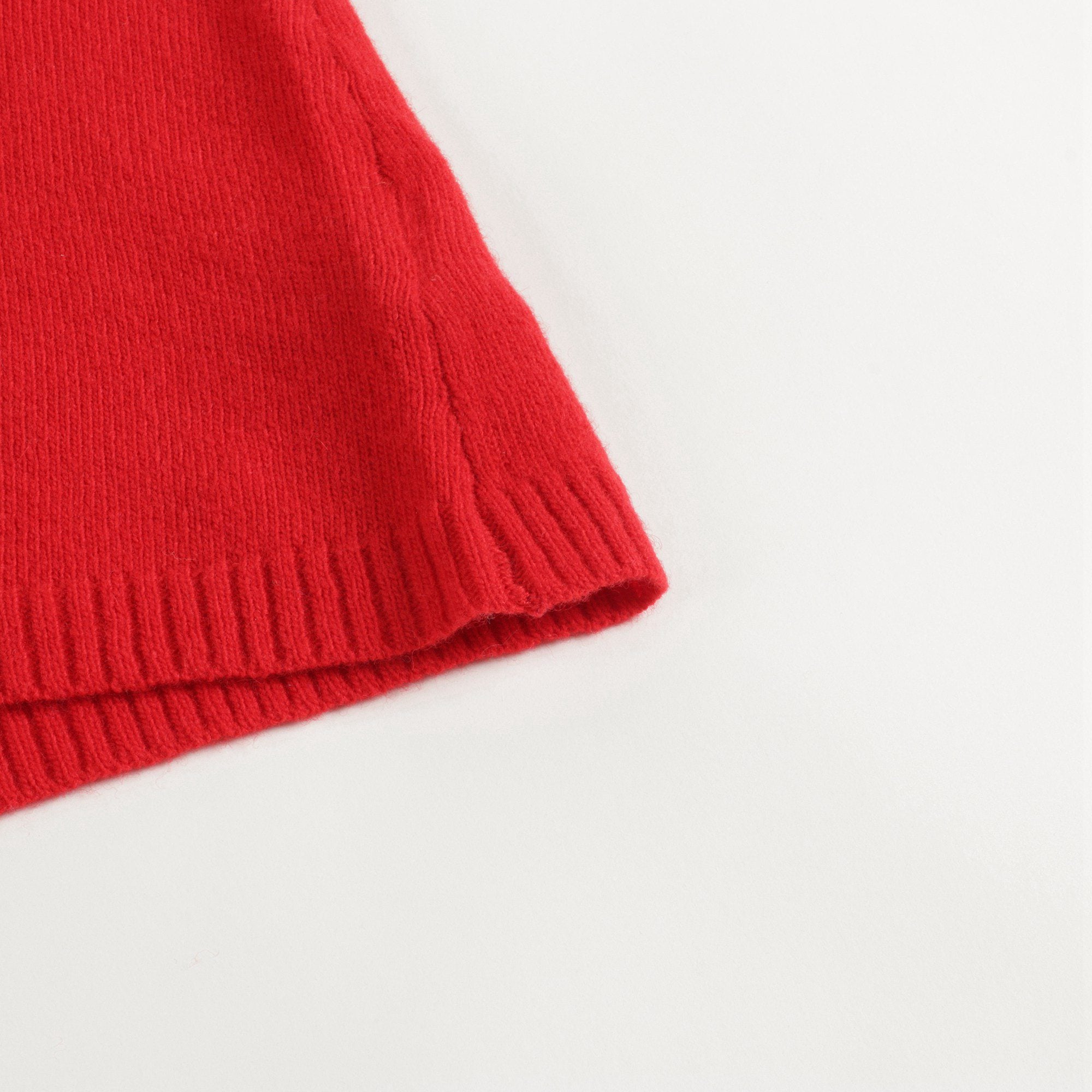 Pull géranium pour bébés filles